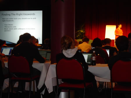 A photo of Ben Teo on stage at UYMG Sydney 2008