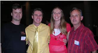 Photo of Vanya and Jody alongside of dad and me